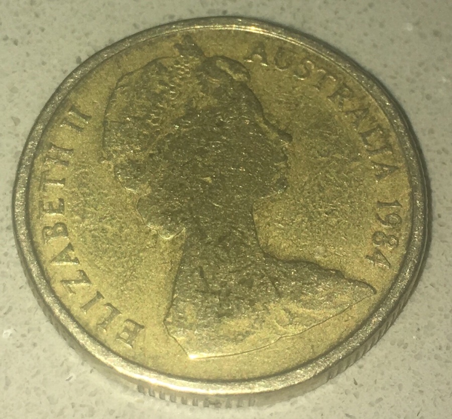 1984-$1-Coin---Die-Fill,-Post-Mint-Damage,-Or-Something-Else?
