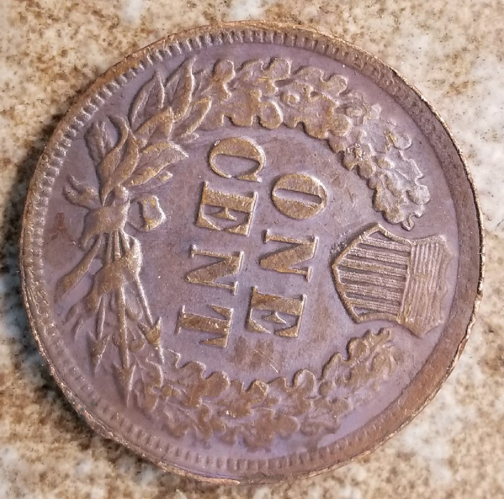 1877-Indian-Head-To-Grade,-Genuine?