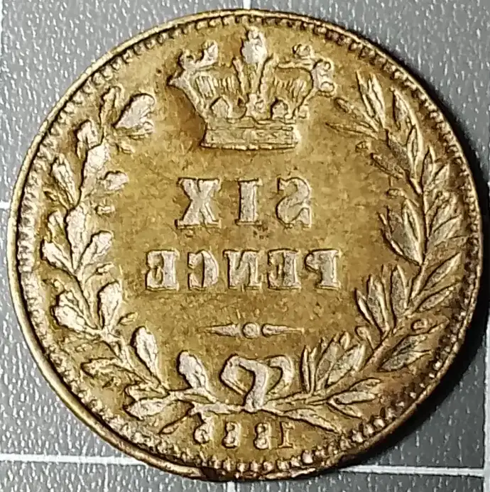 1886?-Sixpence-Mirror-Brockage