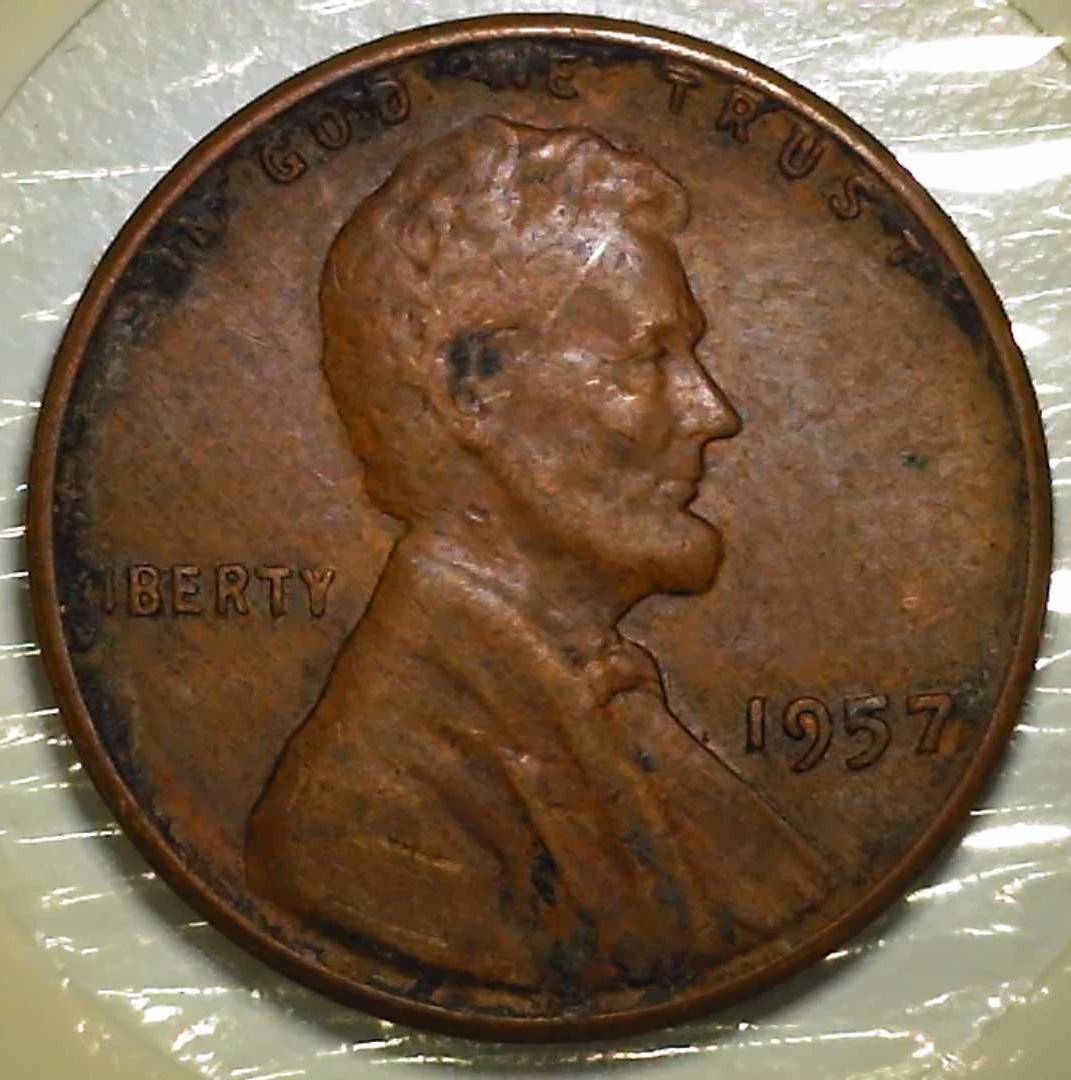 1957-LWC---Struck-Through-Capped-Die-Or-Heavy-Greaser?