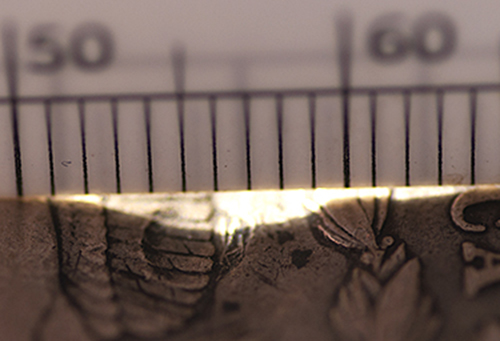 Does-Anybody-Else-Think-This-Morgan-Dollar-Was-Hit-By-A-Bullet?