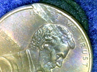 1998-Penny-Struck-Thru-Object