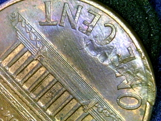 1998-Penny-Struck-Thru-Object