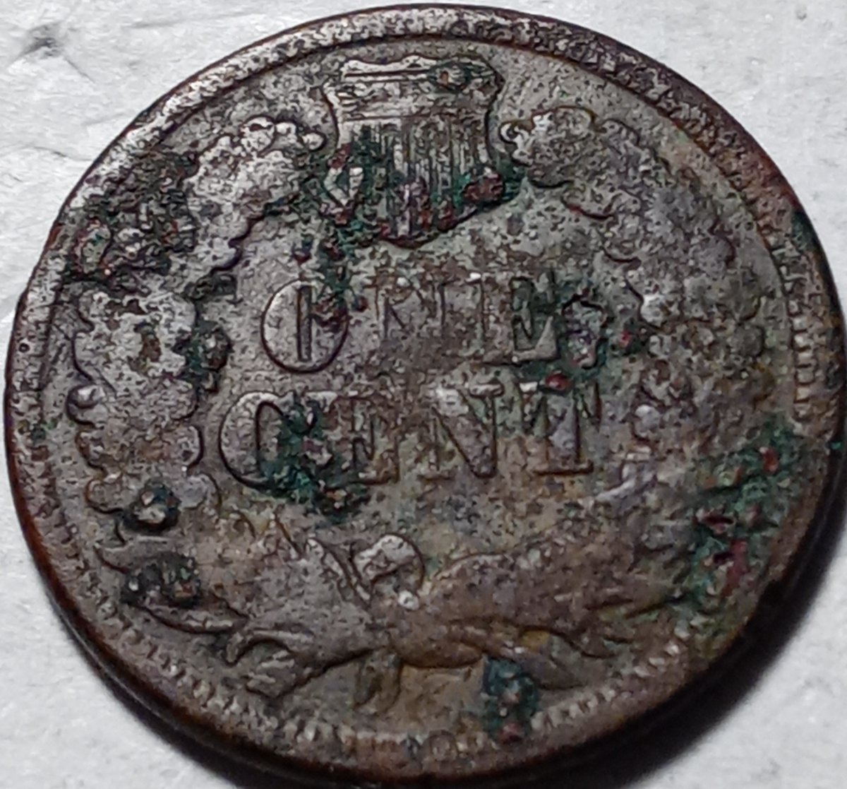 A-Major-Hole-Filled,-1877-Indian-Cent,-Ag-Corrosion