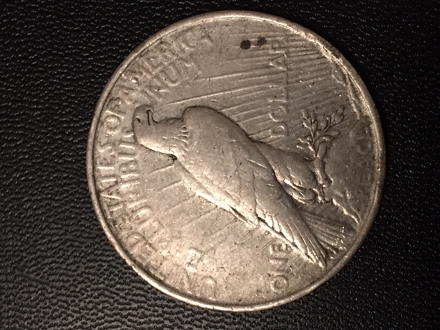 1923-P-Peace-Dollar,-Neck-Crossing-The-Date
