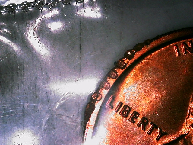 1969-Lincoln-Penny---Mint-Proof-Coin-Still-In-Cellophane-With-Rim-Damage
