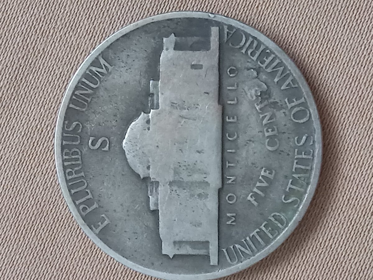 1943-S-Nickel-With-Copper-Streak-In-Front-And-Upside-Down-S-On-Cents-On-Top