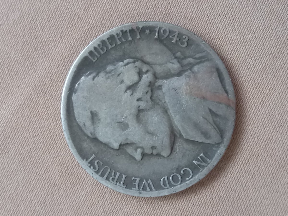 1943-S-Nickel-With-Copper-Streak-In-Front-And-Upside-Down-S-On-Cents-On-Top