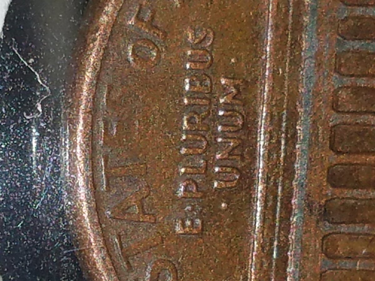 Is-The-Es-In-United-States-Faded-Because-Of-A-Minting-Error-Lmc