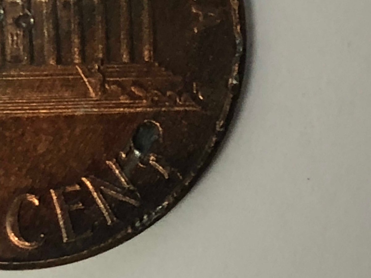 2007-Penny-Multiple-Holes-On-Front-And-Back-Error-Or-Damage?