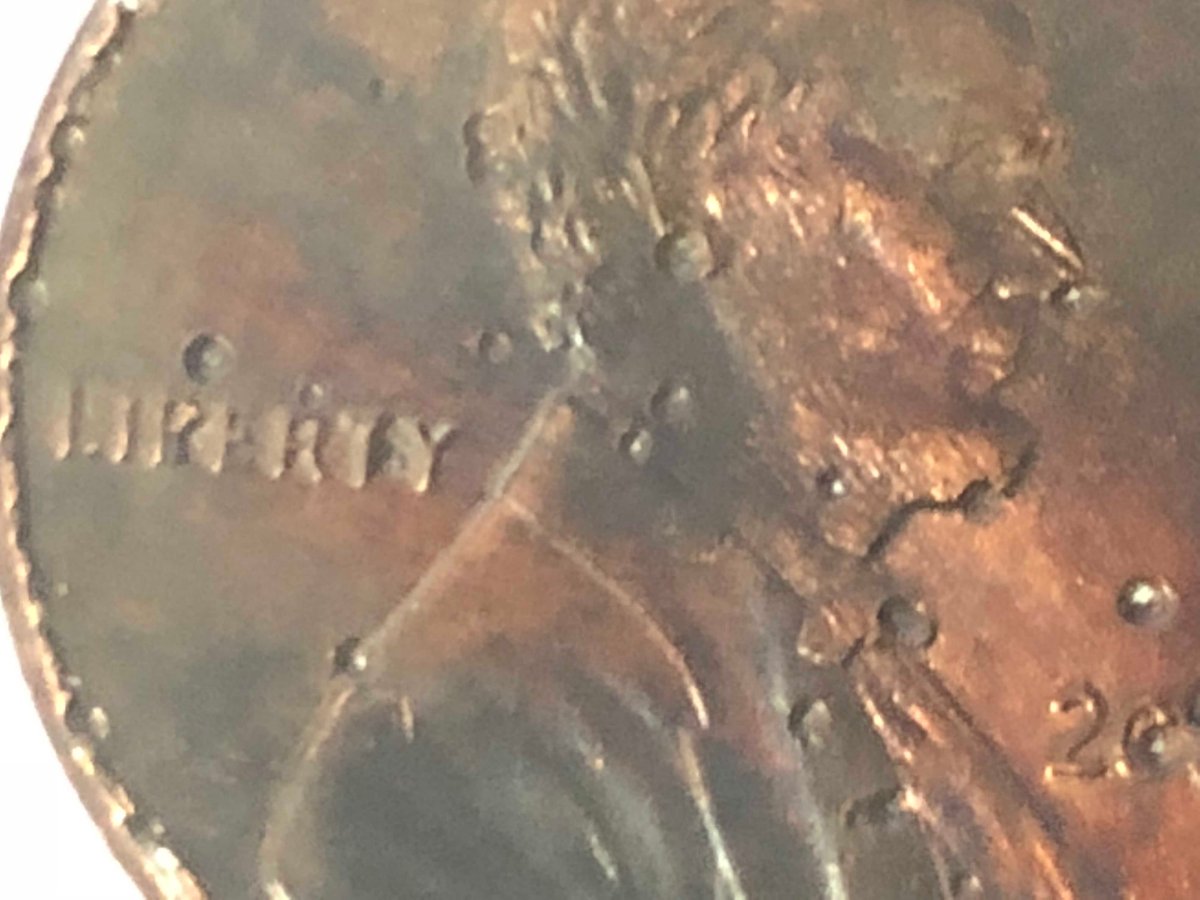 2007-Penny-Multiple-Holes-On-Front-And-Back-Error-Or-Damage?