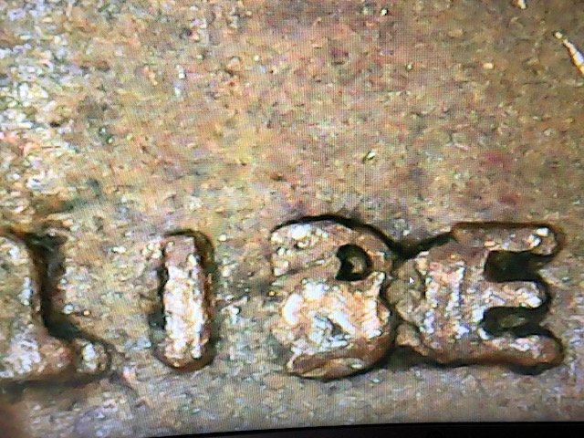1957-D-One-Cent-Die-Chips-On-Liberty
