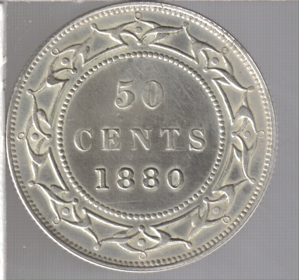 1880-Newfoundland-50-Cent---Counterfeit?