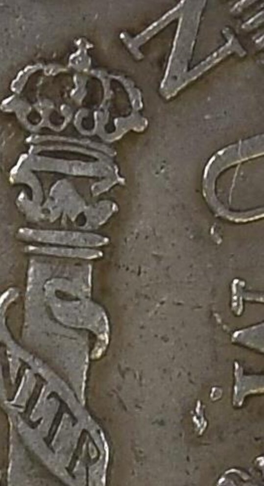 Pitting-Seen-On-A-NGC-Graded-Pillar-Dollar