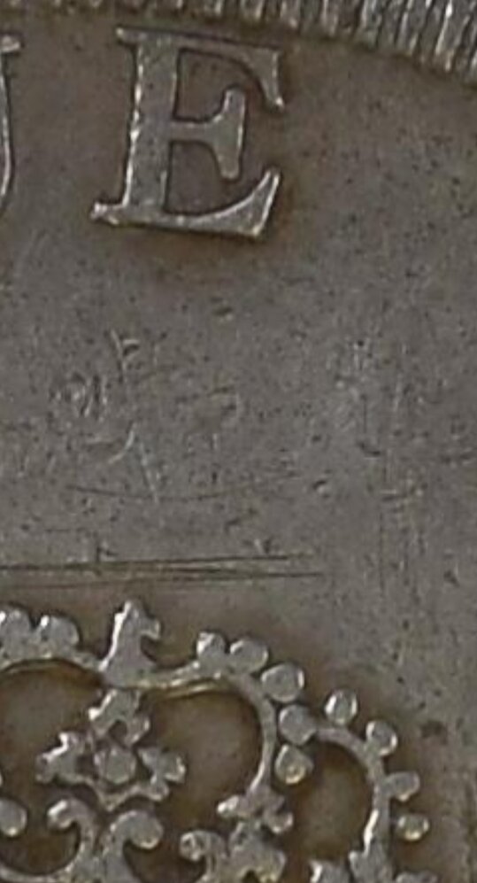 Pitting-Seen-On-A-NGC-Graded-Pillar-Dollar