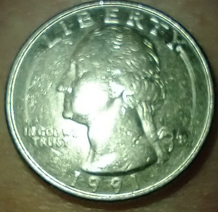 1991-D-Quarter-Looks-Like-A-Partial-Circle-On-Front-Door-Spacing-Of-Liberty-And-The-Bottom-Date