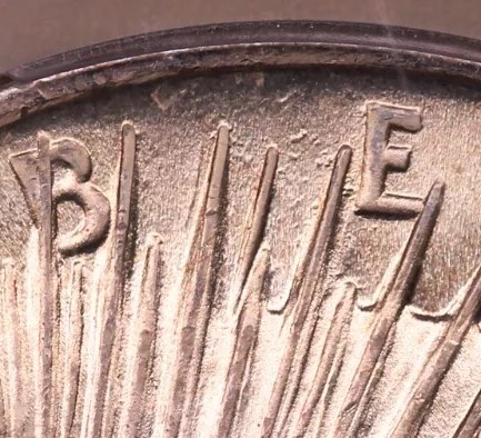 1922-P-VAM-2Ao-Pitted-Die-E-Peace-Dollar