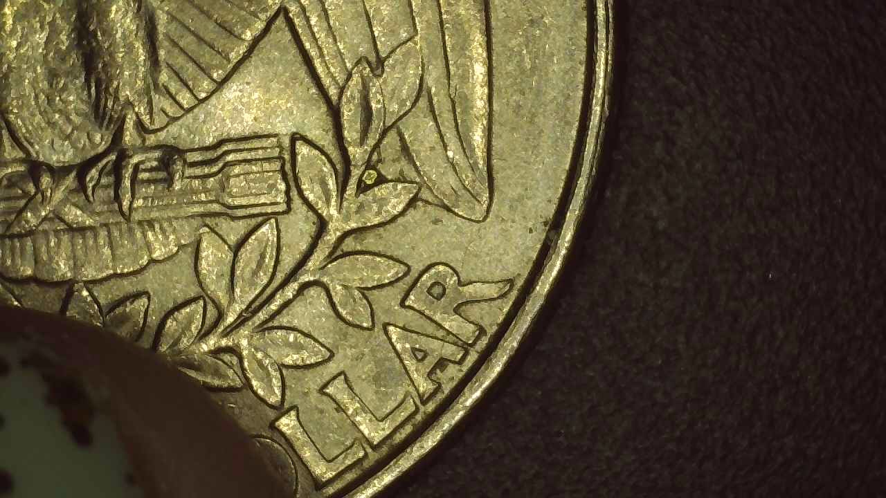 What-Is-This-Gold-Spot-On-1997-Quarter?