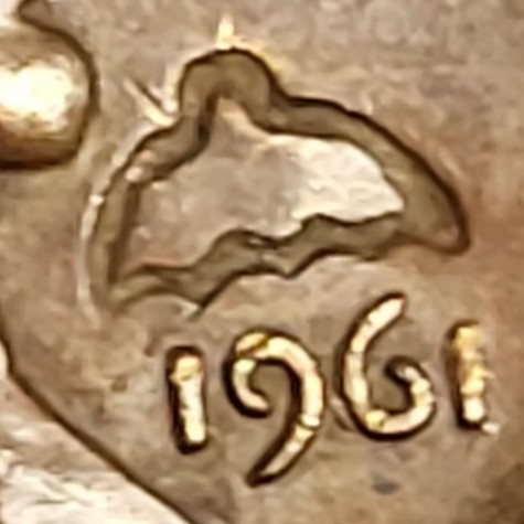 1961-Cent:-I've-Seen-A-Lot-Of-Pennies-With-Different-Emblems.-Counterstamps
