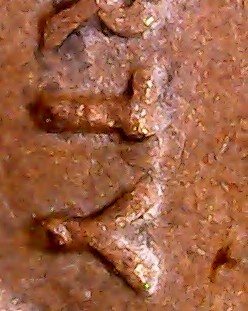 Is-This-1974-D-LMC-A-Cud-Mintmark-And-Partial-T-In-Liberty-Or-Damage?