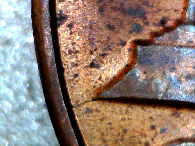 1982-D-LMC-Small-Zin-.RPM-Odverse-Die-Crack-.reverse-Two-Die-Crack.-This-Right