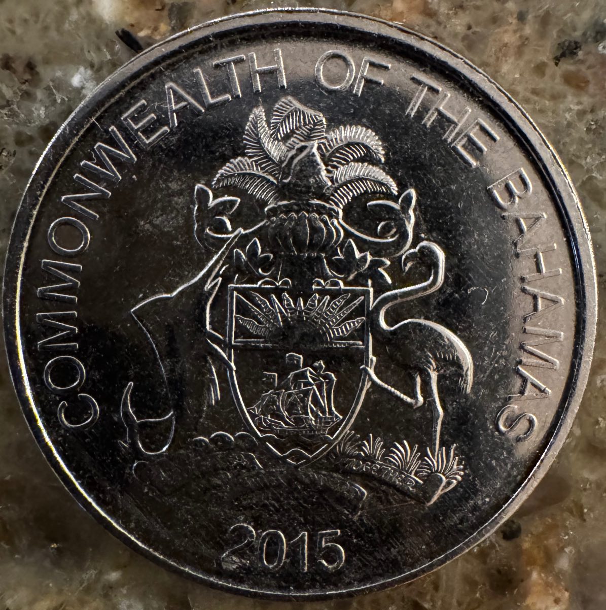 Bahamas-2015-Quarter-25cents---Line-Of-Rim-Metal