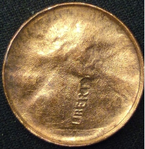 No-Date-Copper-LMC--Struck-Through-Late-Stage-Die-Cap-With-Rotation?