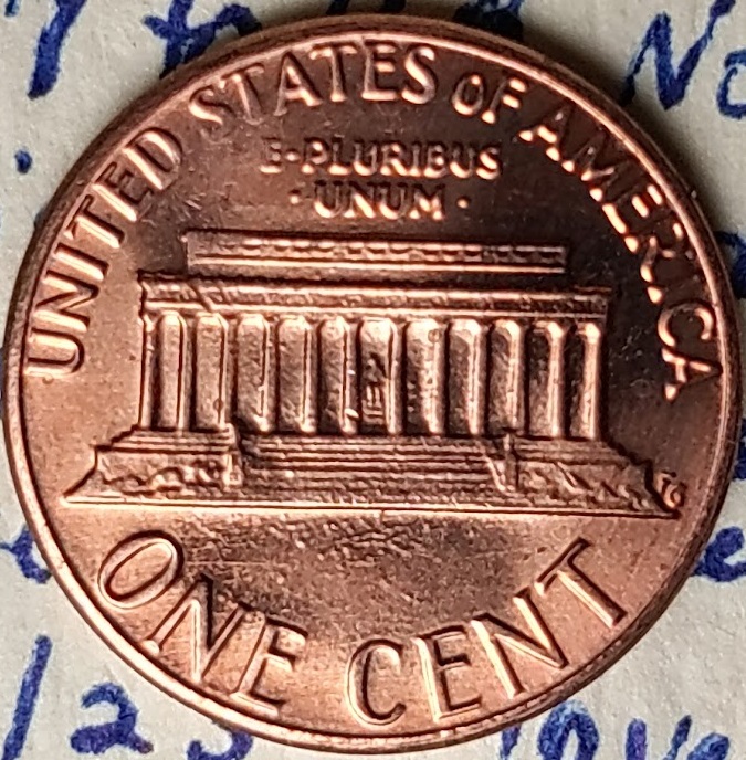 1983-P-Lincoln-Cent-With-A-Secondary,-Incuse-&-Inverted,-Trust-In-The-Corner-Of-The-Rim-And-Field.