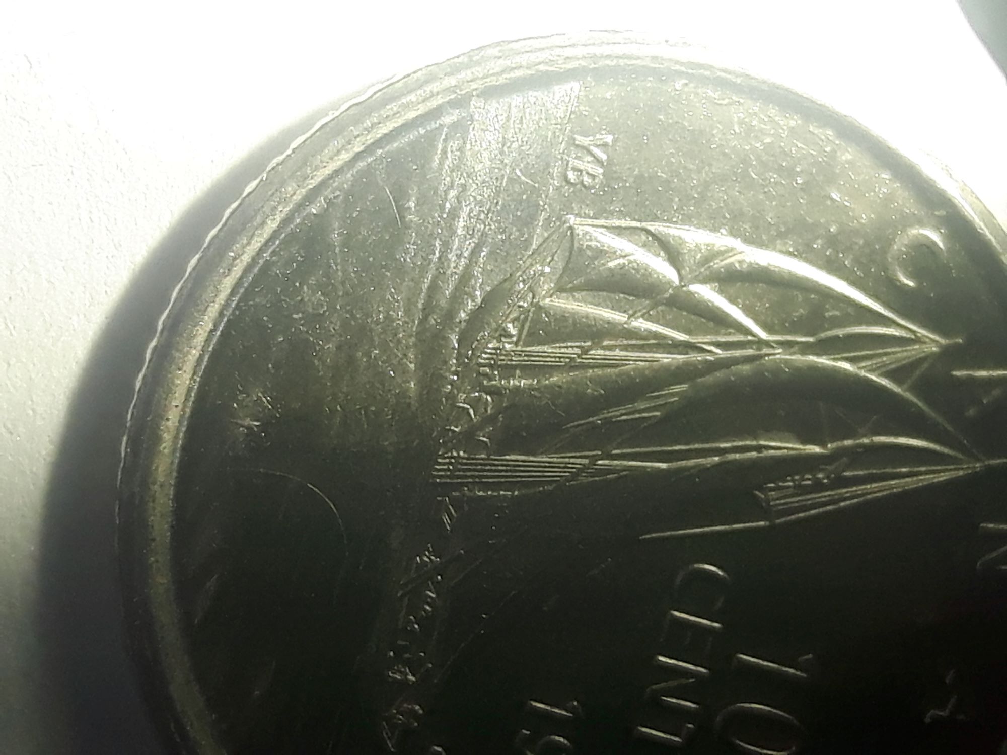 Trying-To-Determine-If-Canadian-Dime-Struck-On-American-Dime