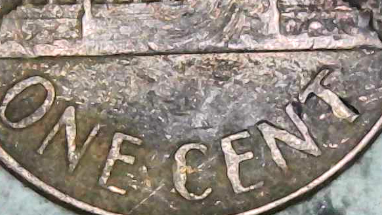 1964-D-Cent-Is-The-Damage-To-The-Reverse-Caused-By-A-Penny-Machine