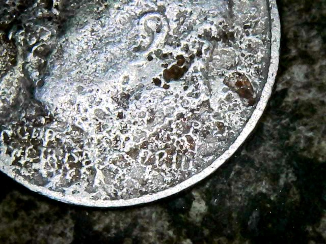 I-Think-Its-A-2010-P-Dime-But-Not-Sure-But-This-Is-From-Some-Kind-Of-Acid-Right-Or-What-Could-It-Be