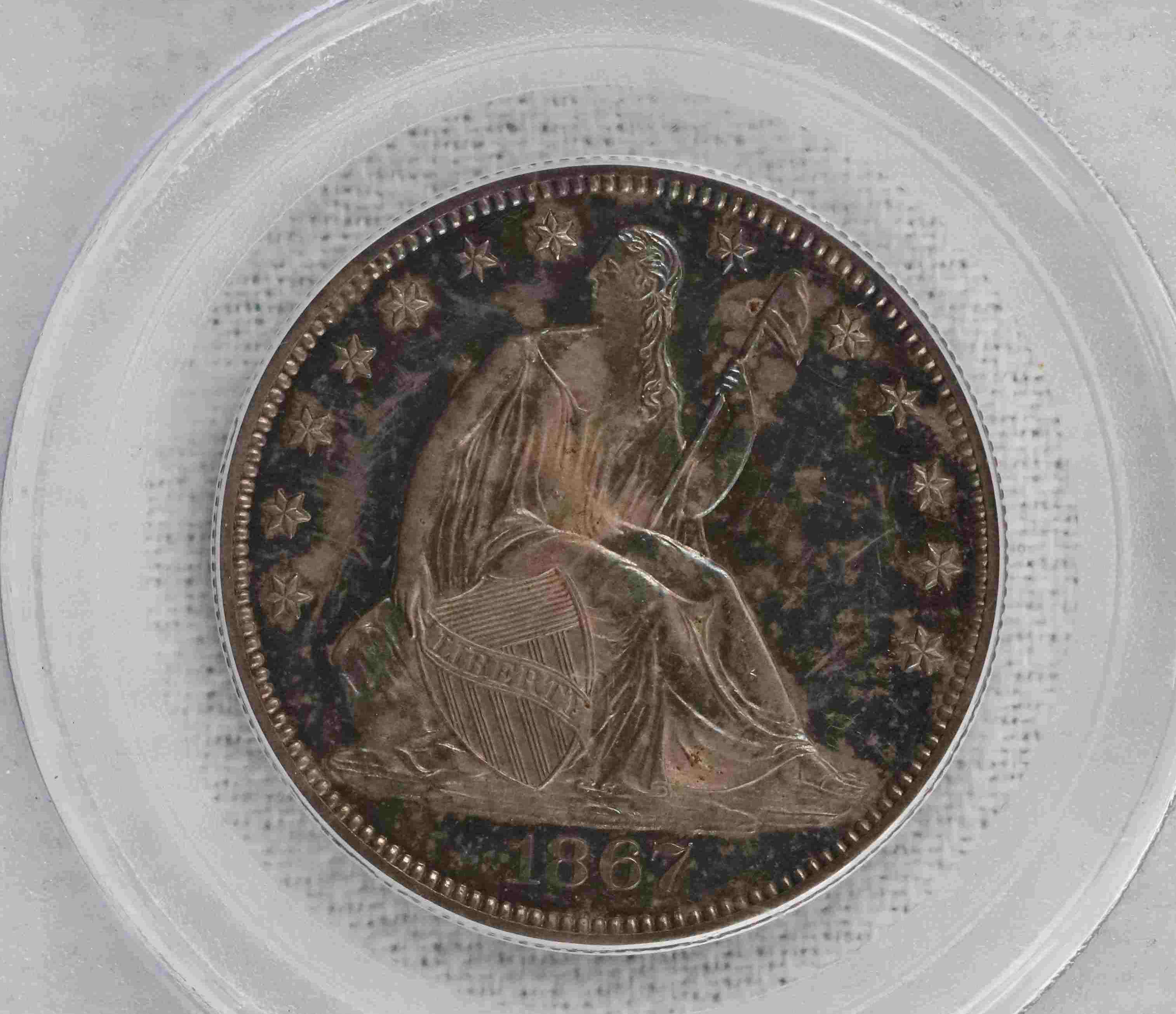 1867-Seated-Liberty-Half-PCGS:-A-Motley-Affair