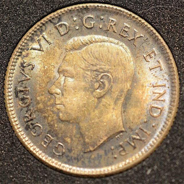 Black-Spots-On-Copper-And-Silver-Coin
