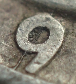 Die-Cracks-On-Washington-Quarters
