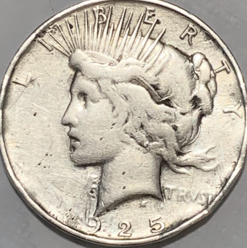 1923-Peace-Silver-Front-And-The-Back-1925-Peace-Silver