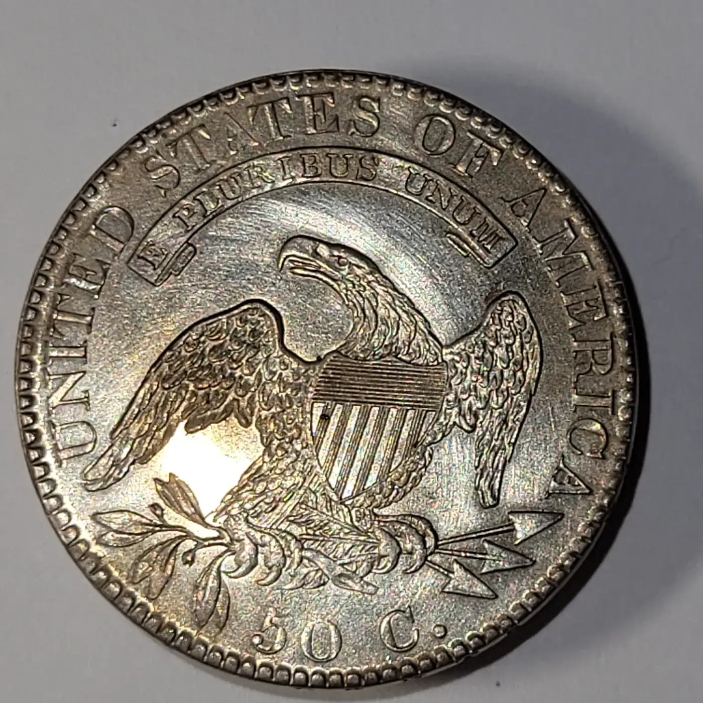 Counterfeit-1820-Capped-Bust-Half