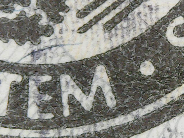 2013-20-Dollar-With-Wierd-Blue-Stripe-Across-Face?