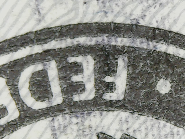 2013-20-Dollar-With-Wierd-Blue-Stripe-Across-Face?