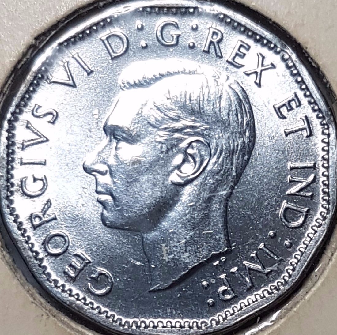 1944-And-1945-Canadian-Nickle...-Holder-Says-Bu-Unc?