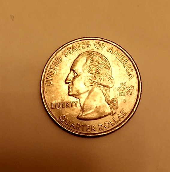2005-Kansas-State-Quarter-Struck-Through-Grease-Error