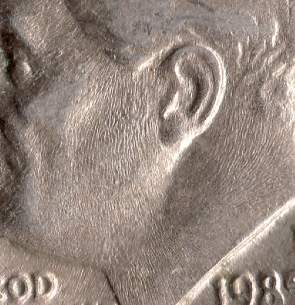 Funny-Looking-Skin-On-On-A-1985-D-And-1984-D-Roosevelt-Dimes