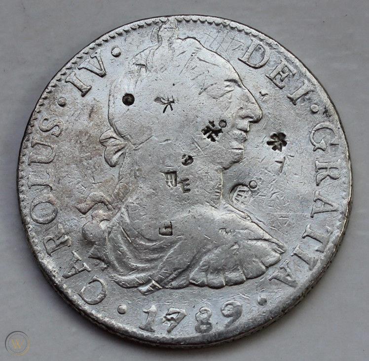 1799-8-Reales-Coin-With-Lots-Of-Counterstamps