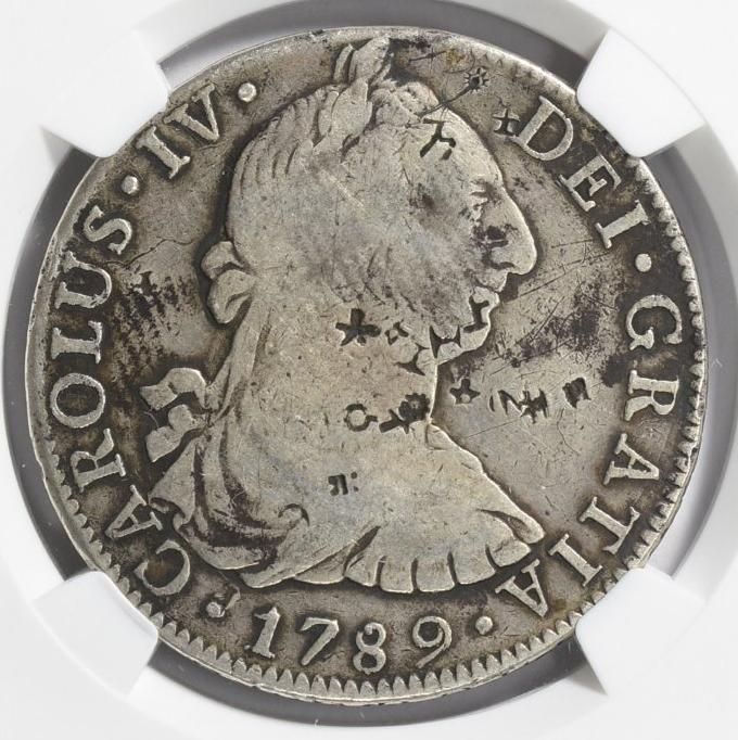 1799-8-Reales-Coin-With-Lots-Of-Counterstamps
