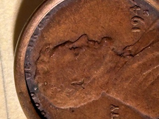 1944-S-Lincoln-Penny-Rounded-Rim-Covers-In-God-We-Trust