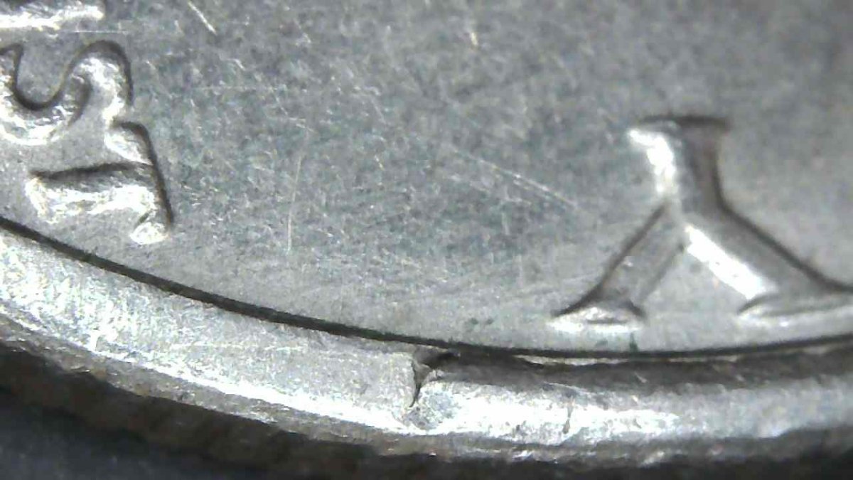 1973-D-Kennedy-Half-Dollar-With-Extra-Rim-Piece?