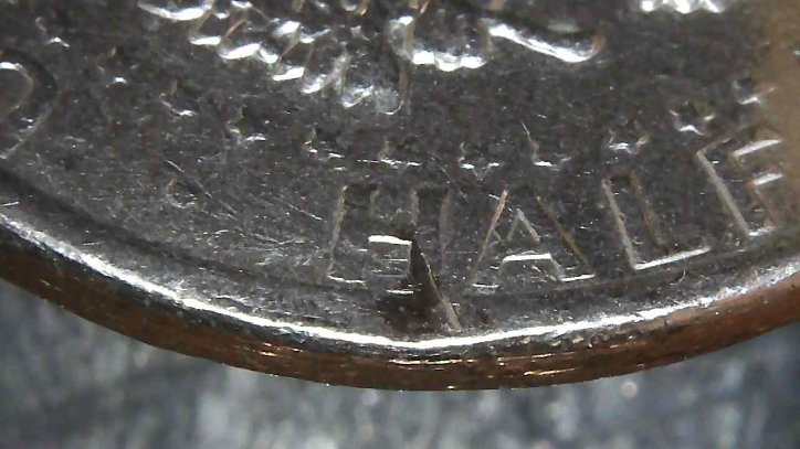 1973-Kennedy--Half-Dollar-Rim-Error-Or-PMD?