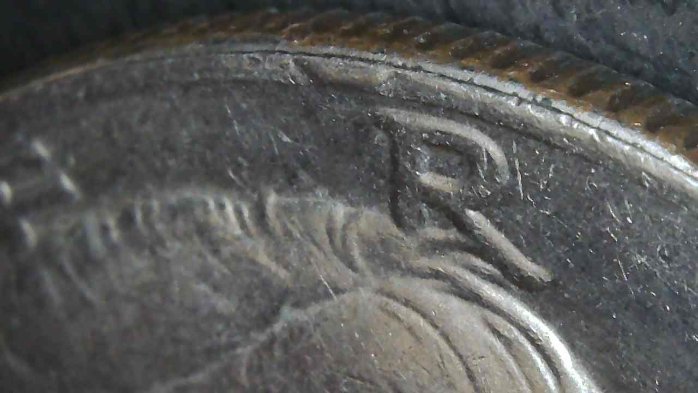 1984-P-Kennedy-Half-Dollar-With-A-Tiny-Rim-Cud-Or-Damage