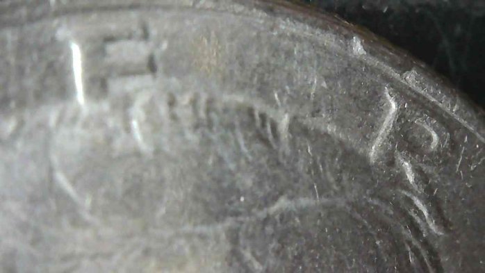 1984-P-Kennedy-Half-Dollar-With-A-Tiny-Rim-Cud-Or-Damage
