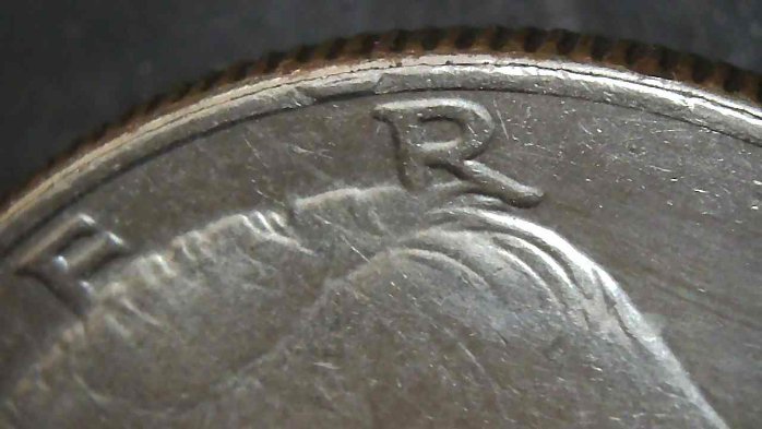 1984-P-Kennedy-Half-Dollar-With-A-Tiny-Rim-Cud-Or-Damage