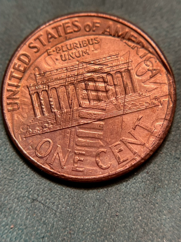 I-Have-Found-A-One-Of-A-Kind-Coin.--Help?-2006-Cent